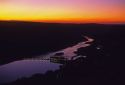 Swan Falls Dam and the Snake River at sunset in Idaho.