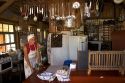 Brazilian woman working in a rustic country restaurant near Sao Paulo, Brazil.