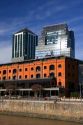 Modern office buildings and older red brick building at Puerto Modero in Buenos Aires, Argentina.