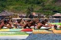 Tahitians take part in an outrigger canoe pirogue race off the island of Moorea.