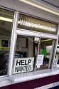 Help wanted sign in the window of a restaurant in Boise, Idaho.