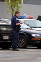 Police officer writing parking tickets in Washington, D.C.