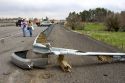 Automoblie accident scene with skid marks and broken guard rail on the interstate near Jerome, Idaho.