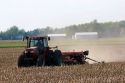 Tractor planting soy beans in the Ohio plains.