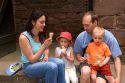 French family eating ice cream outside the Koenigsbourg Castle in Eastern France.