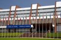 Council of Europe building and flags of member nations in Strasbourg, France.