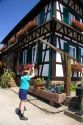 French man pumping water at the village of Betschdorf, France.