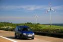Electricity wind generators and automobiles traveling on the highway in northwest Germany.