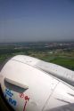 A view out the window of the jet engine of an airliner leaving Munich, Germany.
