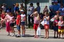 Children watching a small town Fourth of July parade in Cascade, Idaho.