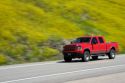 Pick up truck speeing down a highway in Wyoming.