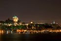 A view of Quebec City and the Chateau Frontenac across the St. Lawrence River at night, Canada.