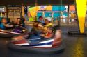 Children and adults ride bumper cars at the Iowa state fair in Des Moines.
