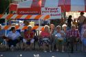 Residents of Traer, Iowa watch a parade for the Festival of the Spiral Steps.