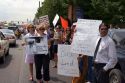 People holding signs at an Anti-war protest in Salt Lake City, Utah. 8/22/2005