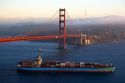 A container ship passes under the Golden Gate Bridge in the San Francisco Bay, California.