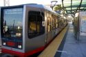 A street car or trolley parked at a station in San Francisco, California.