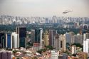 Aerial view of Sao Paulo and a helicopter in flight, Brazil.