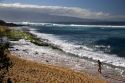 A beach scene on Maui, Hawaii at Lower Paia Beach.