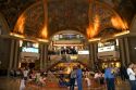 Fresco paintings adorn the ceiling of Galeria Pacifico and cafe seating in Buenos Aires, Argentina.