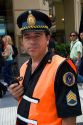 National Police sergeant holding a radio in Buenos Aires, Argentina.