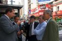 Business men talk on the street in Buenos Aires, Argentina.
