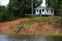 House on stilts along the Arasa River in the Amazon jungle near Manaus, Brazil.