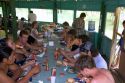 Guests share a meal at a lodge in the Amazon jungle near Manaus, Brazil.