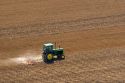 Aerial view of a tractor tilling a field in Canyon County, Idaho.