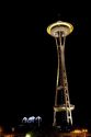 The Space Needle lit up at night in Seattle, Washington.