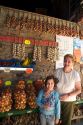 French woman and her granddaughter selling garlic at Saint-Broladre in the nation of Brittany a province of France.