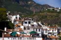 Rooftop cafe and tile roofed homes at Taxco in the State of Guerrero, Mexico.