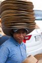 Mexican street vendor selling hats in the plaza at Taxco in the State of Guerrero, Mexico.