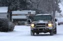 Four wheel drive truck driving on snow covered roads in Boise, Idaho.