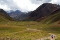 People walk on a trail near Mount Aconcagua in the Andes Mountain Range, Argentina.