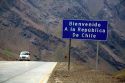 Road sign welcoming you to Chile on the Argentina border in the Andes Mountain Range.