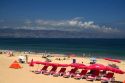 Beach scene in Renaca on the Pacific Ocean in Chile with Vina del Mar and Valparaiso in the background.