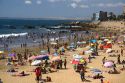 Crowded beach scene at Concon on the the Pacific Ocean in Chile.