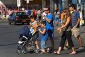 Family eating ice cream while crossing the street in Valparaiso, Chile.