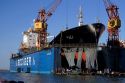 Floating dry dock with container ship in the Port at Valparaiso, Chile.