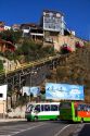 Tram-like vehicles are part of a funicular railway at Valparaiso, Chile.