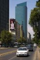 Traffic and highrise buildings on Libertador General Bernardo O'Higgins Avenue, popularly known as Alameda, the main street in Santiago, Chile.