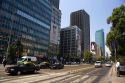 Traffic and highrise buildings on Libertador General Bernardo O'Higgins Avenue, popularly known as Alameda, the main street in Santiago, Chile.