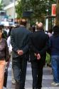 Businessmen walk on the Paseo Ahumada in Santiago, Chile.