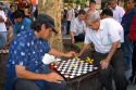 Chilean men play checkers in the Plaza de Armas in Santiago, Chile.