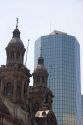 The Metropolitan Cathedral and modern office building in Santiago, Chile.