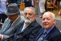 Elderly Chilean men sit on a bench together in Santiago, Chile.