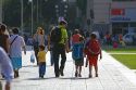 Father walking with his sons in Santiago, Chile.