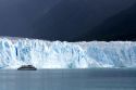 Tour boat in front of the Perito Moreno Glacier located in the Los Glaciares National Park in the south west of Santa Cruz province, Patagonia, Argentina.
