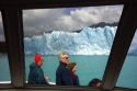 Passengers on a tour boat at the Perito Moreno Glacier located in the Los Glaciares National Park in the south west of Santa Cruz province, Patagonia, Argentina.